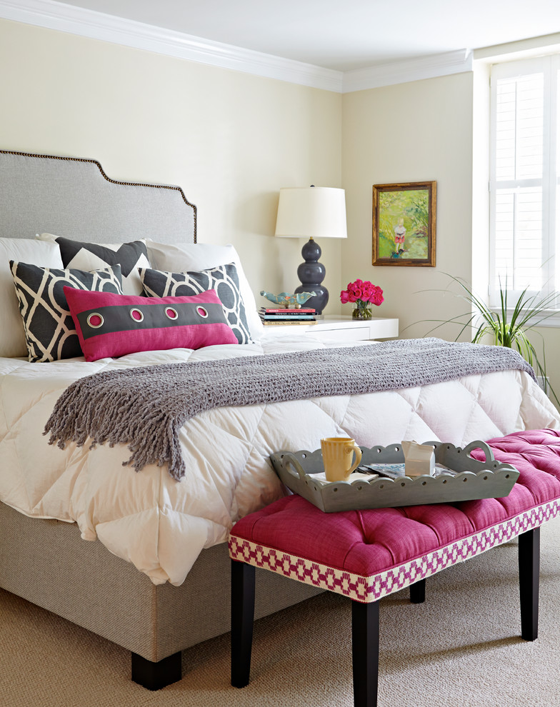 Classic grey and pink bedroom in Richmond with beige walls and carpet.