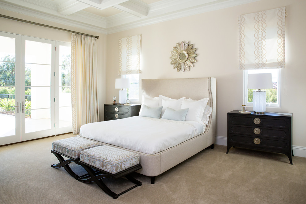 Inspiration for a medium sized classic master bedroom in San Diego with beige walls, carpet and beige floors.