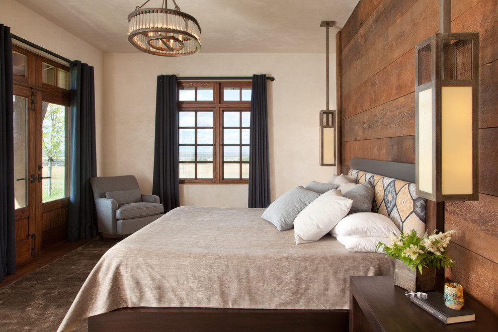 Inspiration for a rustic carpeted bedroom remodel in Miami with beige walls