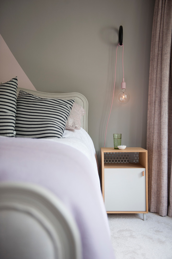 Design ideas for a contemporary grey and pink bedroom in Belfast.
