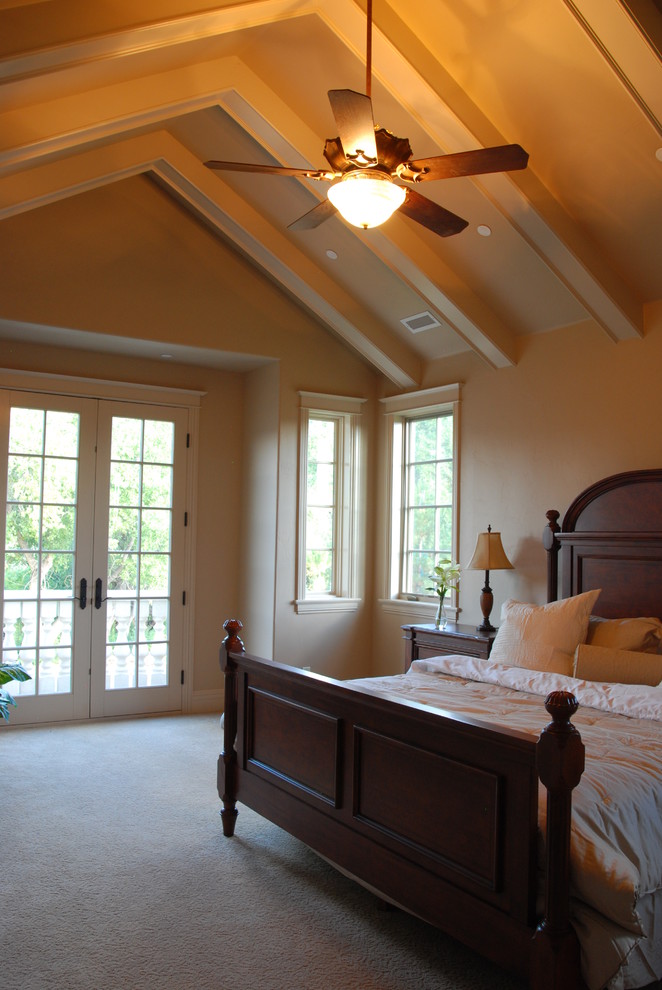 Inspiration for a large timeless master carpeted bedroom remodel in Denver with beige walls and no fireplace