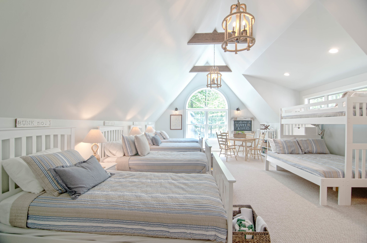 Design ideas for an expansive traditional guest bedroom in Portland Maine with grey walls, carpet and beige floors.