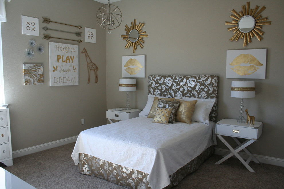 This is an example of a medium sized bohemian guest and grey and silver bedroom in Sacramento with grey walls and carpet.
