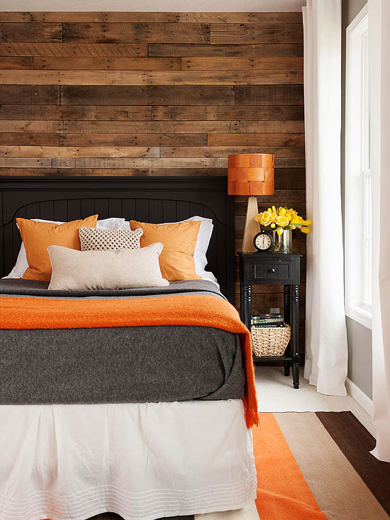 Inspiration for a rustic bedroom remodel in Other with brown walls