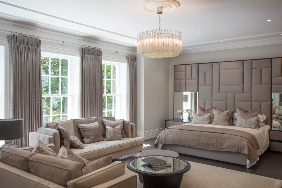 This is an example of a contemporary bedroom in Surrey.