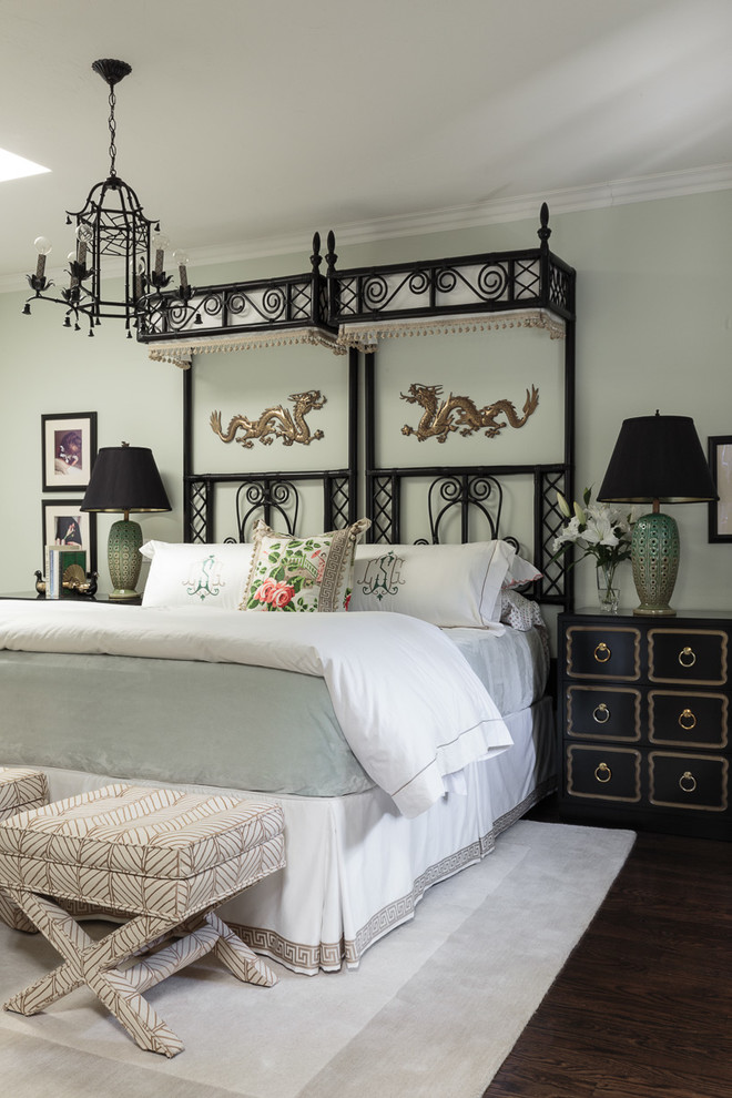 Inspiration for a mid-sized eclectic master dark wood floor bedroom remodel in San Francisco with green walls