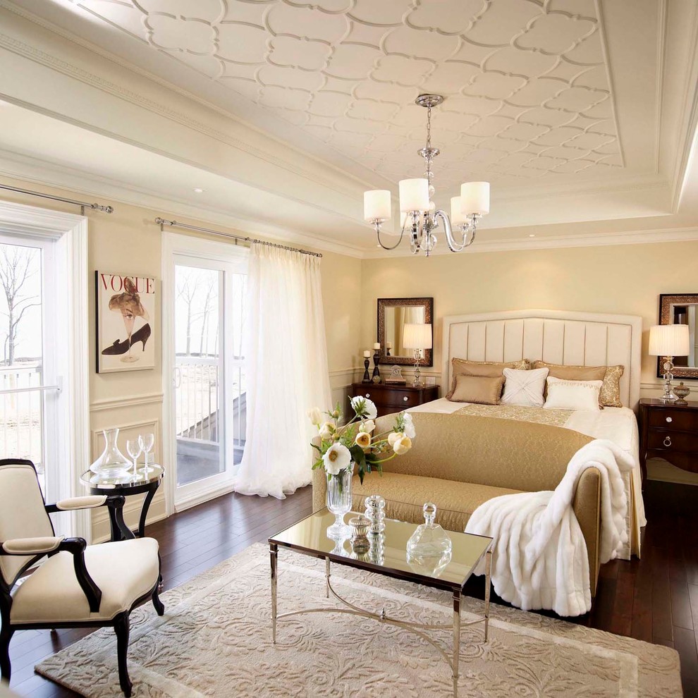 Mid-sized elegant master dark wood floor bedroom photo in Toronto with beige walls