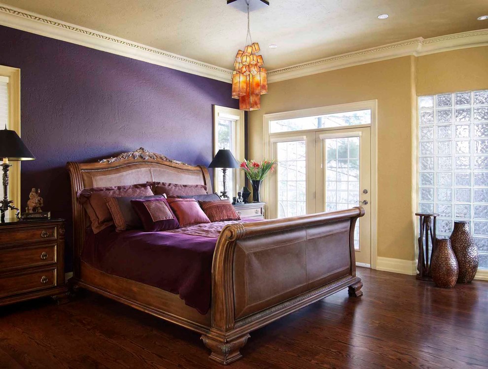 Bedroom - mid-sized eclectic master dark wood floor bedroom idea in Toronto with beige walls