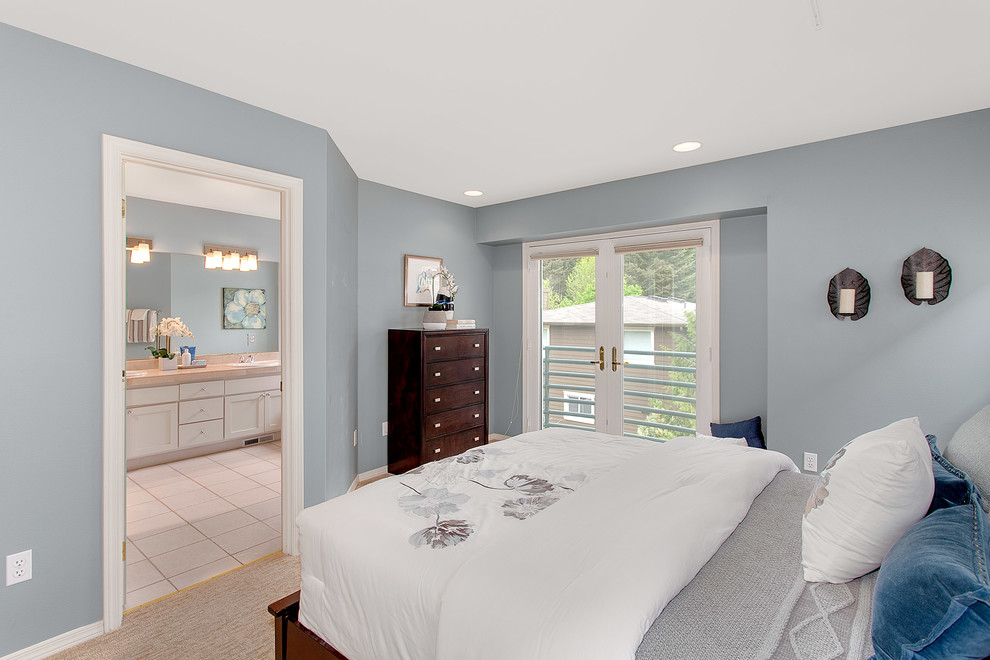 Bedroom - large transitional master carpeted bedroom idea in Seattle with blue walls and no fireplace