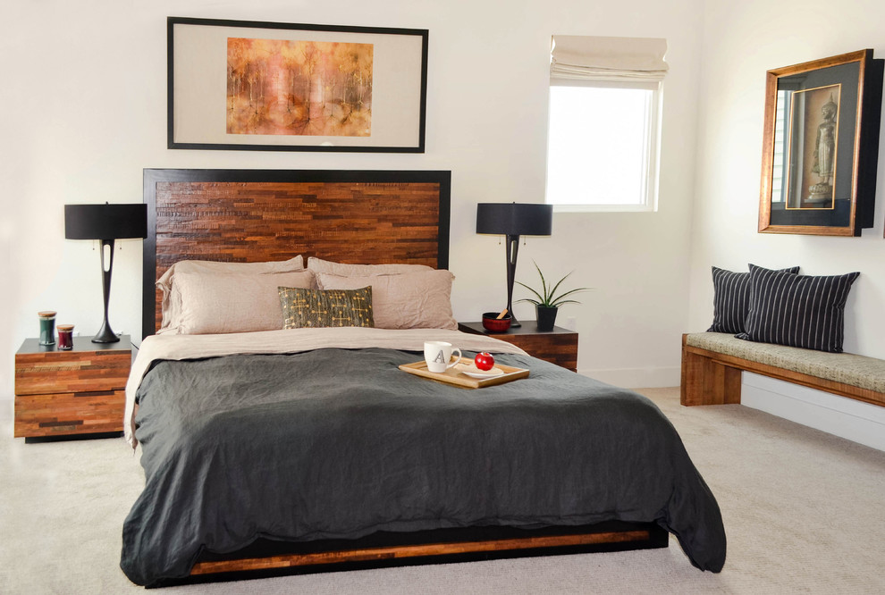 Example of a huge asian master carpeted and beige floor bedroom design in Los Angeles with white walls and no fireplace