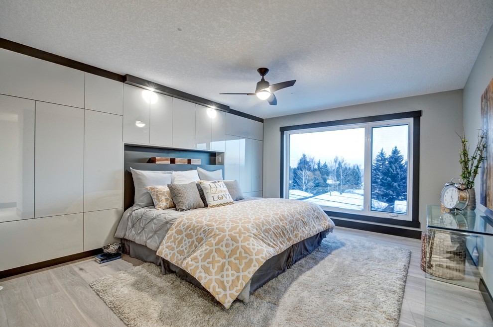 Photo of a contemporary master bedroom in Vancouver.