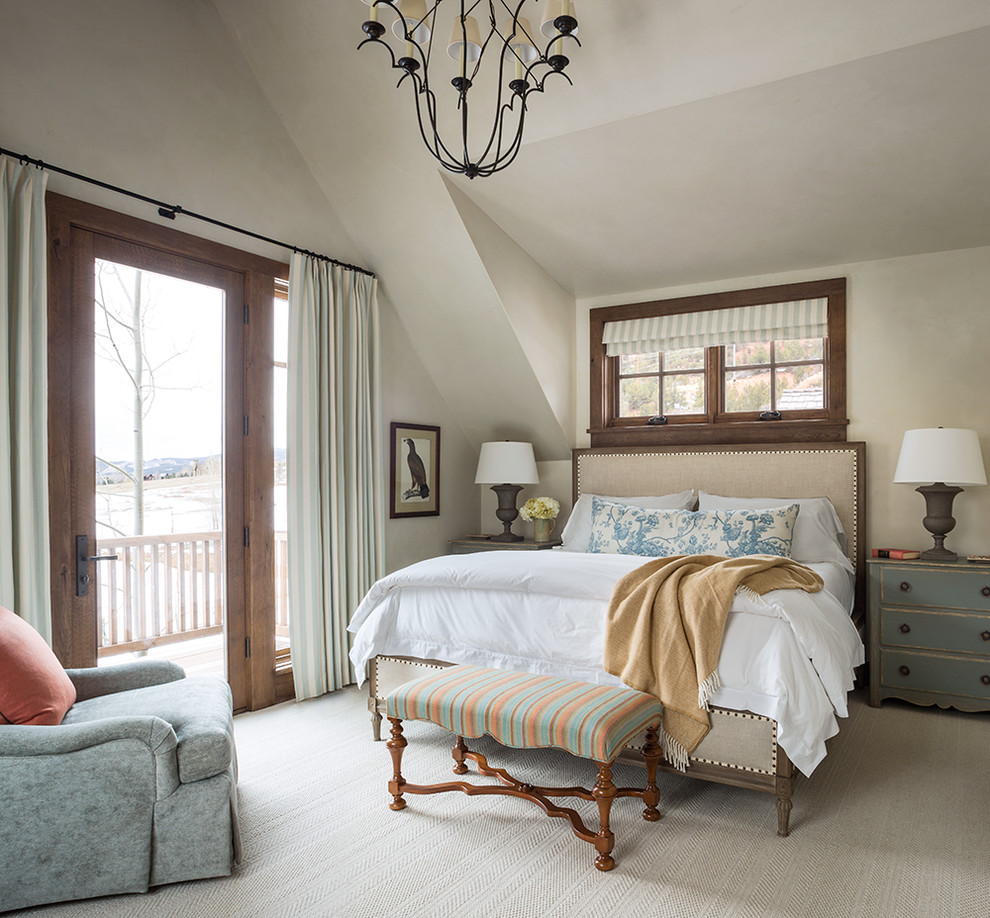 This is an example of a rustic master bedroom in Dallas with beige walls, carpet and beige floors.