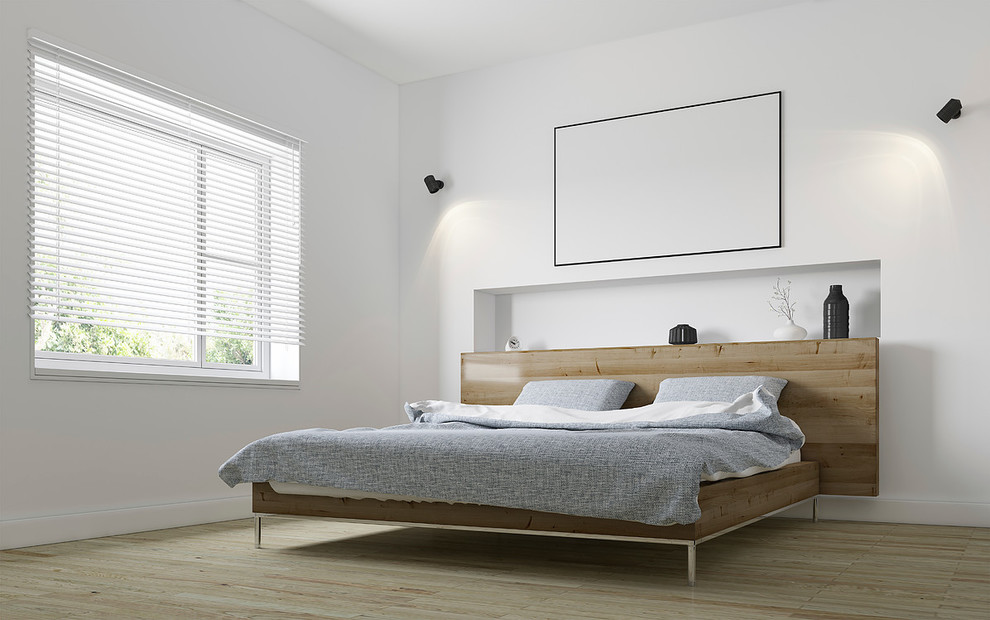 На фото: хозяйская спальня среднего размера в стиле модернизм с белыми стенами, полом из ламината и бежевым полом без камина с