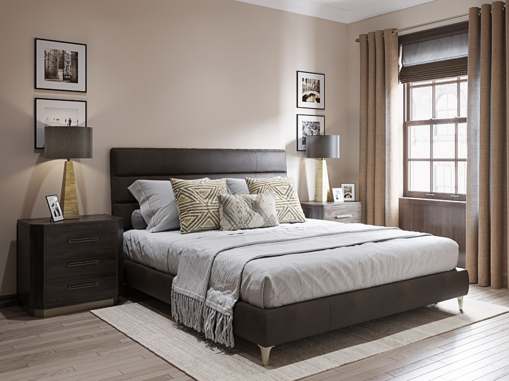 Modelo de dormitorio principal contemporáneo sin chimenea con paredes beige y suelo de madera clara