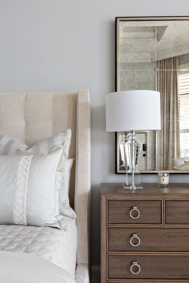 Inspiration for a classic bedroom in Orange County with grey walls and carpet.
