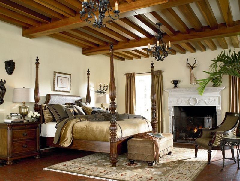 Idee per una camera da letto classica con pareti beige, pavimento con piastrelle in ceramica, camino classico e cornice del camino in intonaco