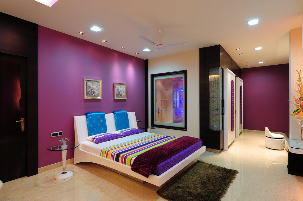 Bedroom - contemporary bedroom idea in Mumbai with purple walls