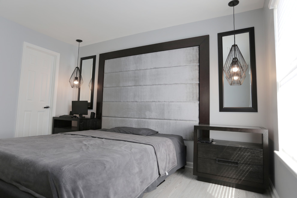 ワシントンD.C.にある中くらいなコンテンポラリースタイルのおしゃれな主寝室 (グレーの壁、ラミネートの床、グレーの床) のレイアウト