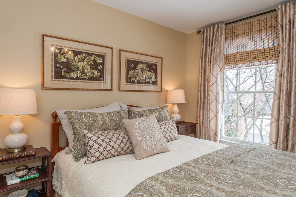 Mid-sized elegant guest carpeted bedroom photo in DC Metro with beige walls and no fireplace