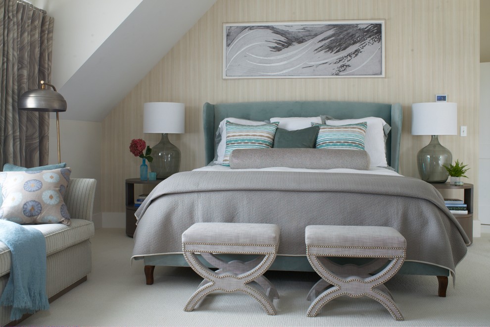 Photo of a large beach style master bedroom in Providence with beige walls, carpet and no fireplace.