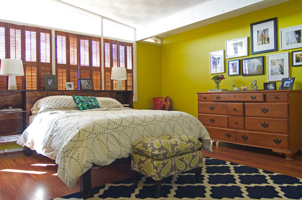 Bedroom - contemporary medium tone wood floor bedroom idea in Dallas with green walls