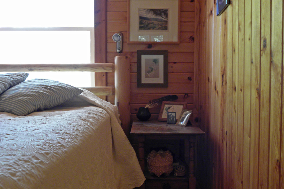 Example of a country bedroom design in Boise