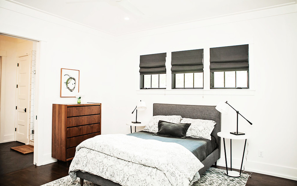 Design ideas for a scandi master bedroom in Charlotte with white walls and dark hardwood flooring.