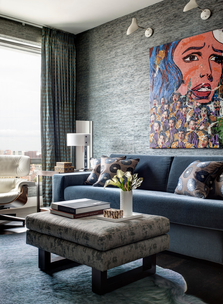 This is an example of a modern guest bedroom in Boston with blue walls and light hardwood flooring.