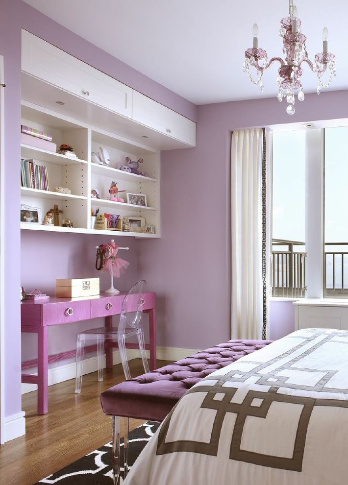 Design ideas for a medium sized traditional guest and grey and purple bedroom in New York with purple walls and medium hardwood flooring.