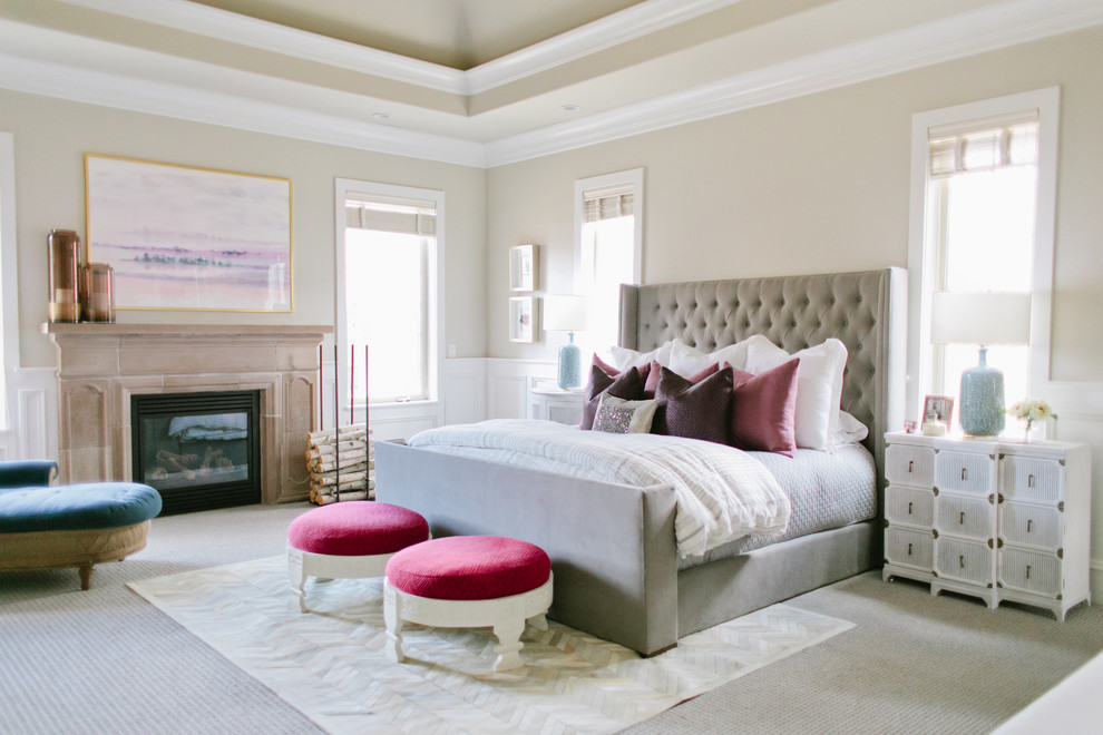Transitional master bedroom photo in Salt Lake City with beige walls and a standard fireplace