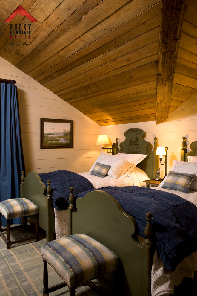 Mid-sized mountain style bedroom photo in Other with yellow walls, a standard fireplace and a stone fireplace