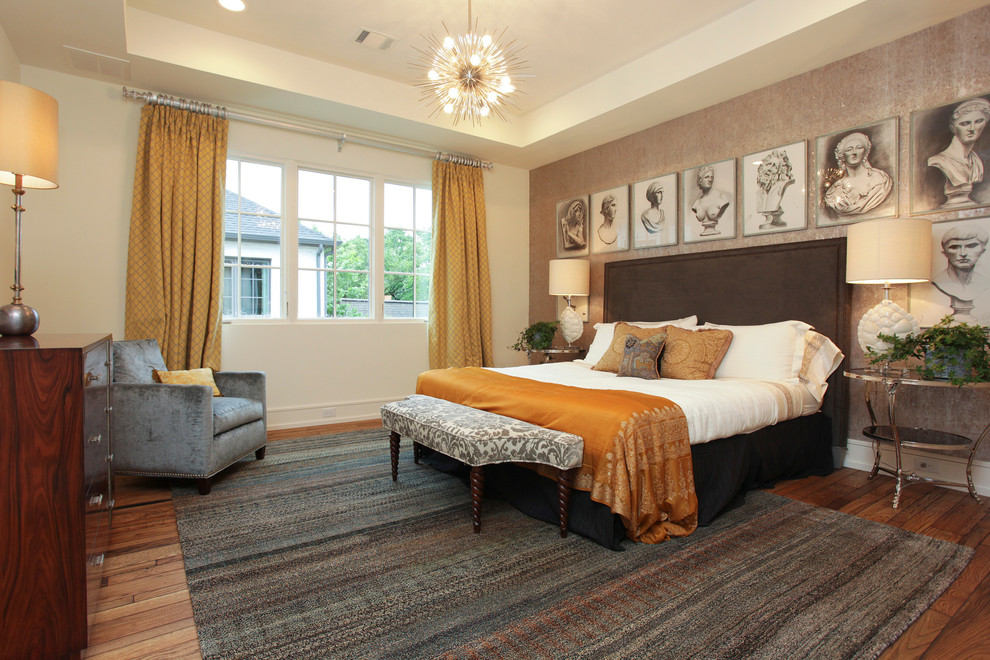 Photo of a traditional bedroom in Houston with multi-coloured walls and dark hardwood flooring.