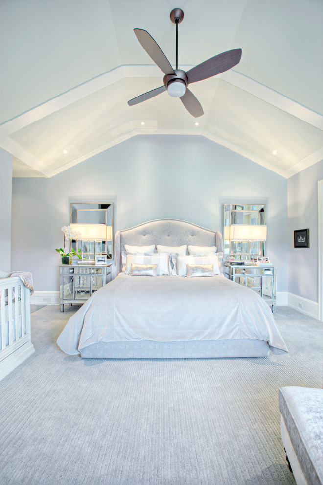 Design ideas for a classic bedroom in Calgary with blue walls and carpet.
