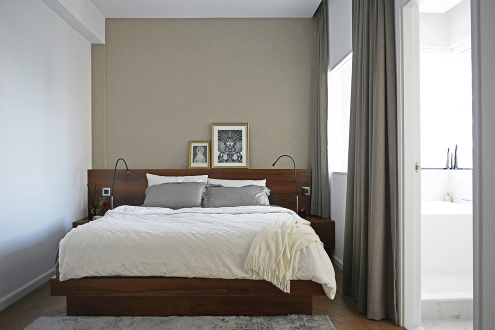 Ejemplo de dormitorio contemporáneo con paredes blancas