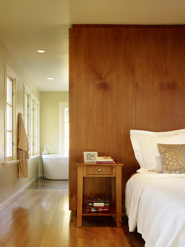 Bedroom - small modern master light wood floor bedroom idea in San Francisco with green walls and no fireplace