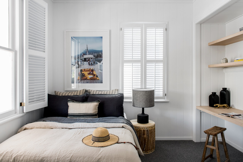 Nautical grey and black bedroom in Brisbane with white walls, carpet and grey floors.