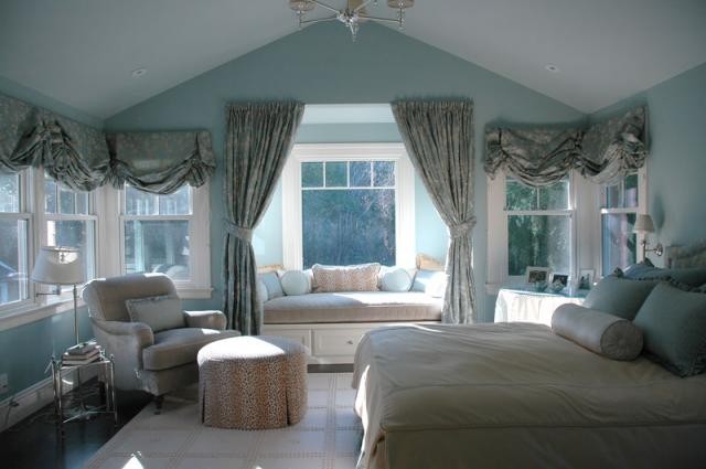 Mid-sized elegant master dark wood floor and brown floor bedroom photo in San Francisco with blue walls