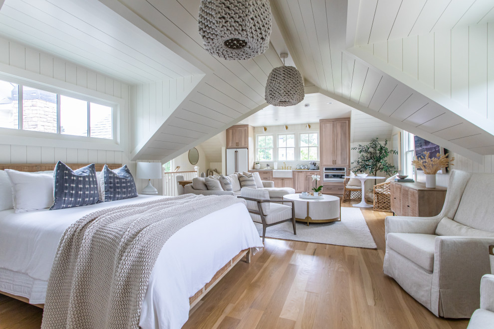 Inspiration for a bedroom in Atlanta with white walls, light hardwood flooring, brown floors, a timber clad ceiling and tongue and groove walls.