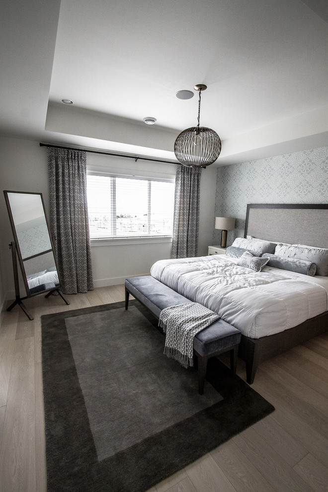 Inspiration for a medium sized classic master and grey and white bedroom in Vancouver with light hardwood flooring, no fireplace, white walls and grey floors.