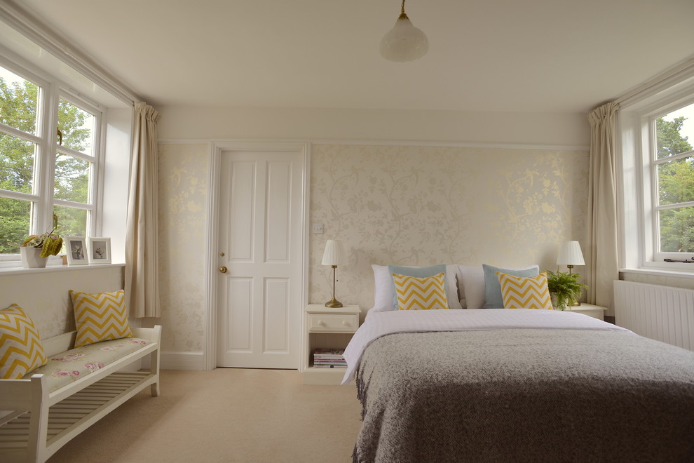 Design ideas for a medium sized rural master bedroom in Sussex with carpet, no fireplace, beige floors and white walls.