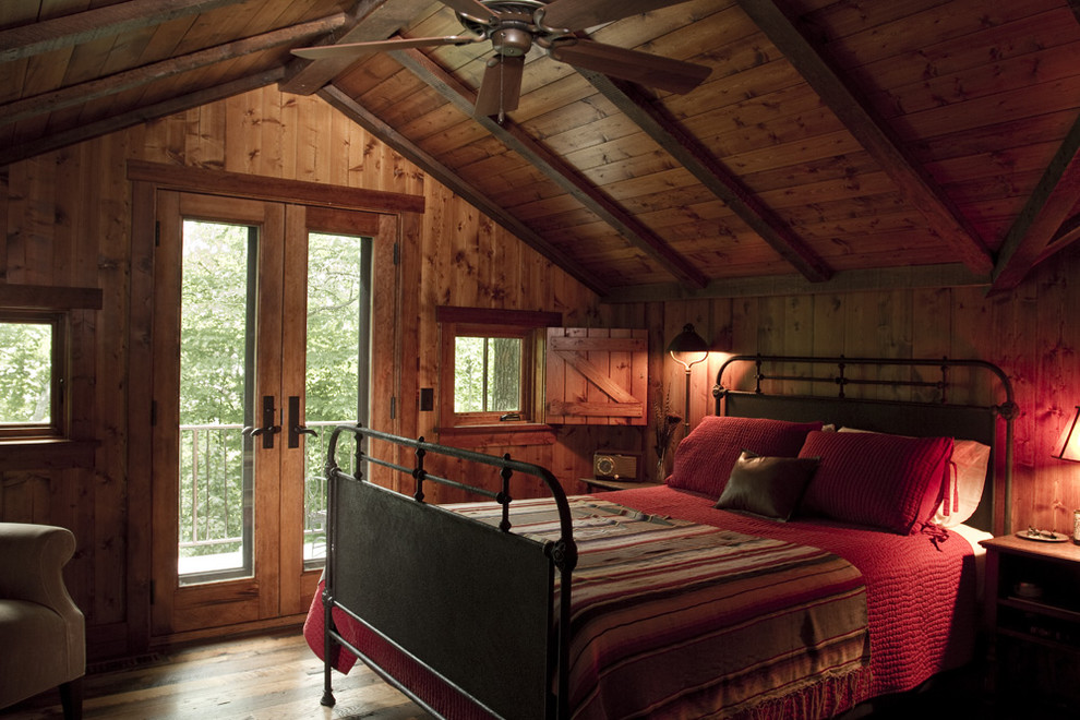 Photo of a rustic bedroom in Minneapolis.