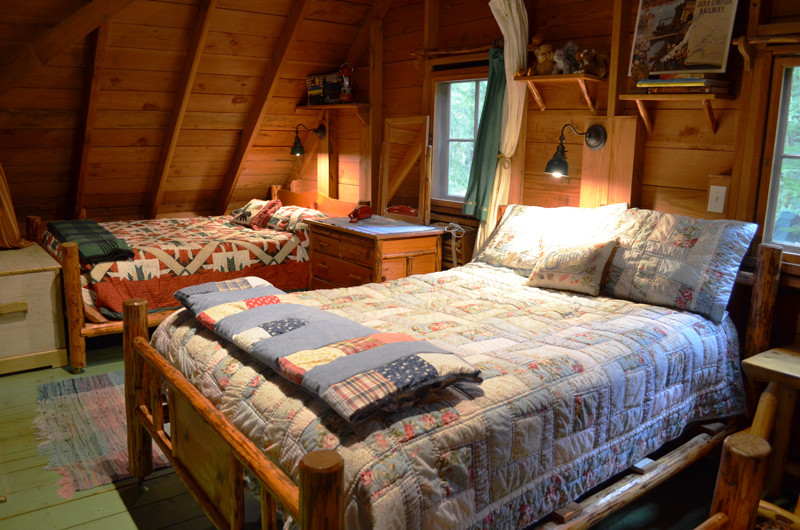 Inspiration for a rustic bedroom remodel in Portland