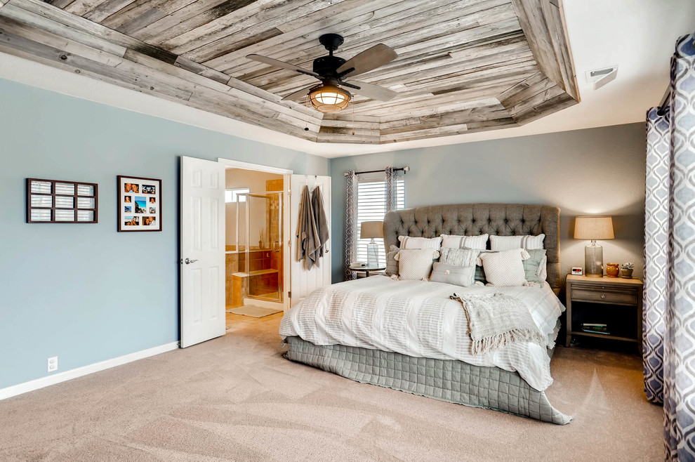 Mid-sized farmhouse master carpeted and beige floor bedroom photo in Denver with blue walls and no fireplace