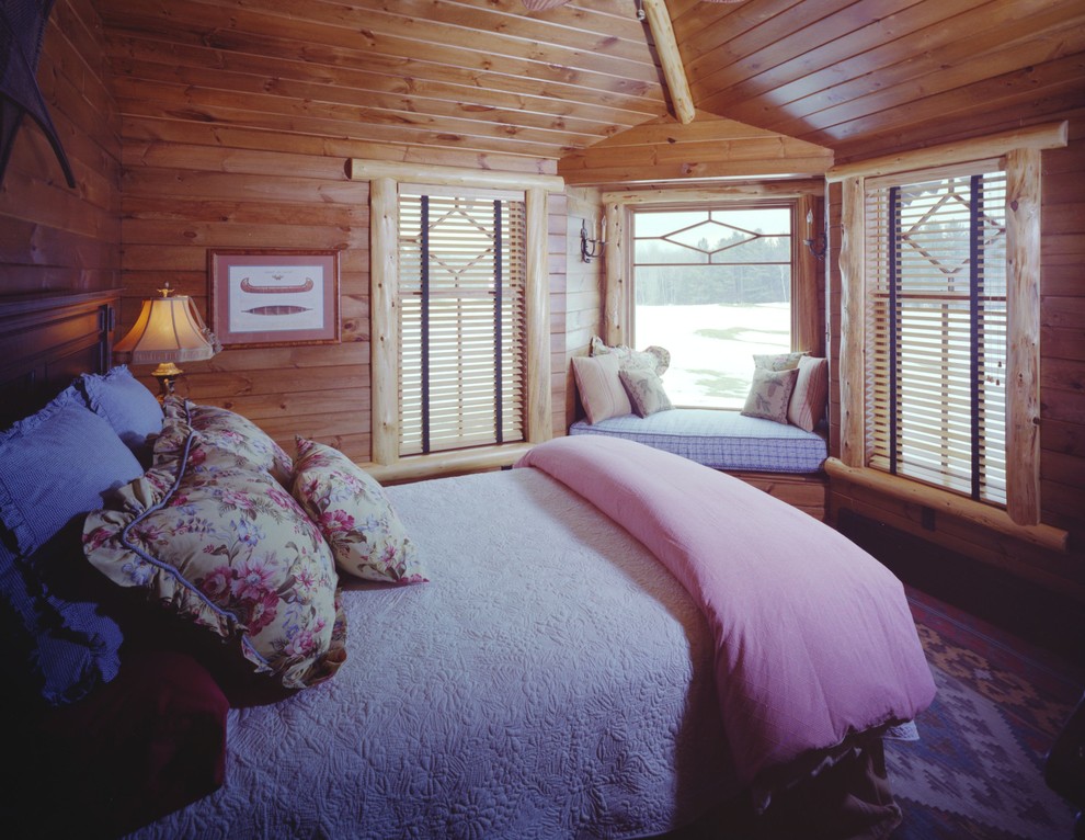 Foto på ett rustikt sovrum