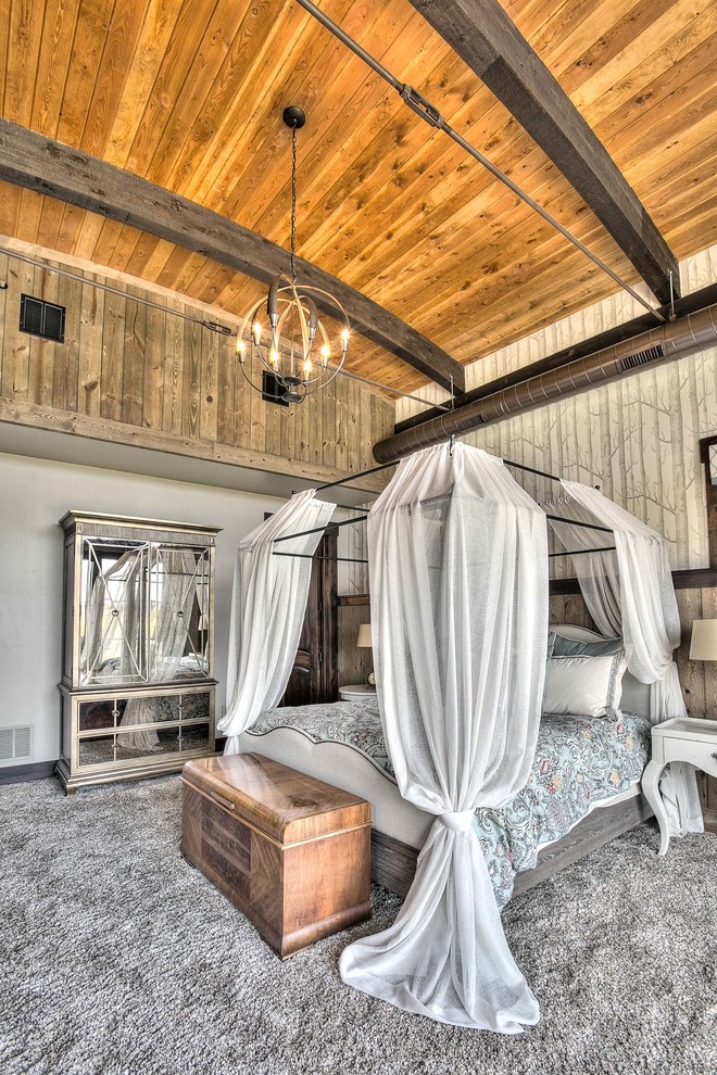 Diseño de dormitorio principal rural extra grande sin chimenea con paredes beige y moqueta