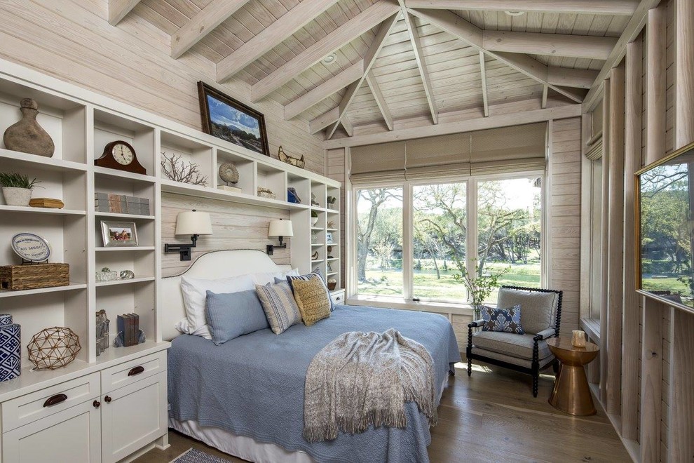 Bedroom - small coastal guest dark wood floor and brown floor bedroom idea in Austin with no fireplace and gray walls