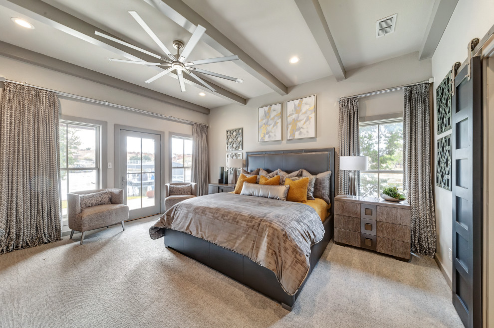 This is an example of a large contemporary master bedroom in Dallas with grey walls, carpet and grey floors.