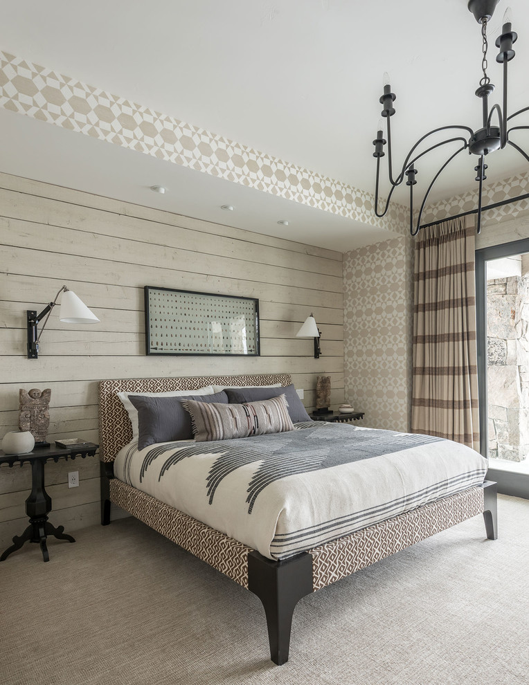 Immagine di una camera da letto rustica con moquette