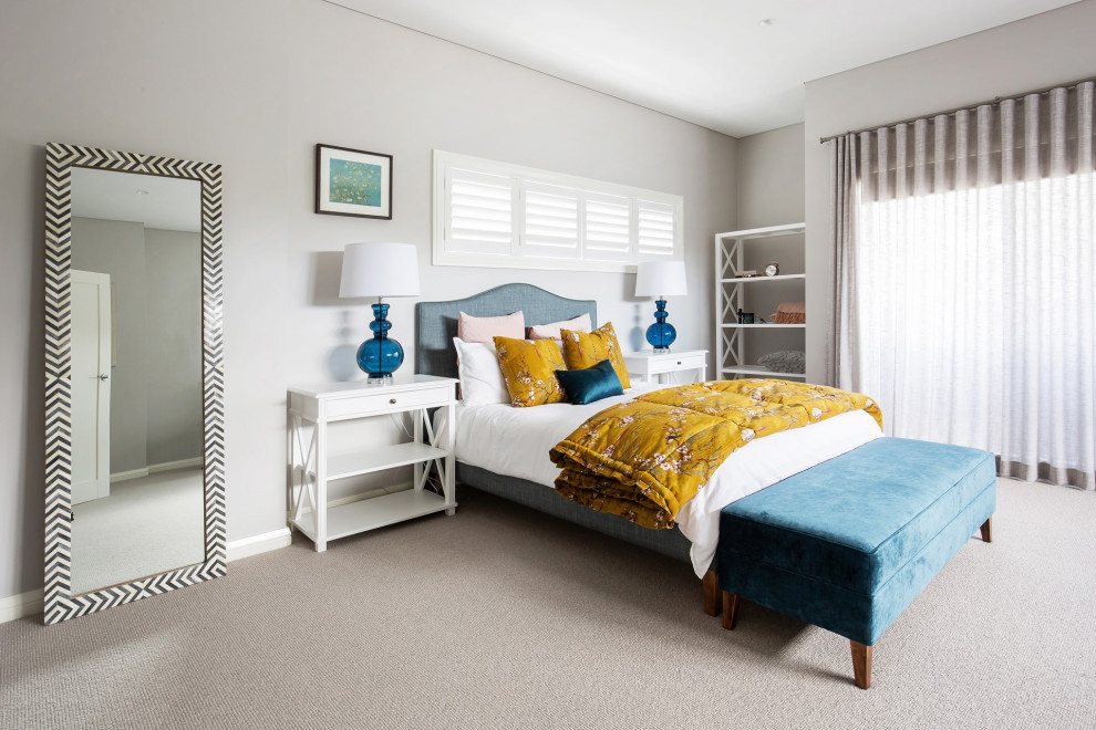 Large transitional master carpeted and gray floor bedroom photo in Sydney with gray walls