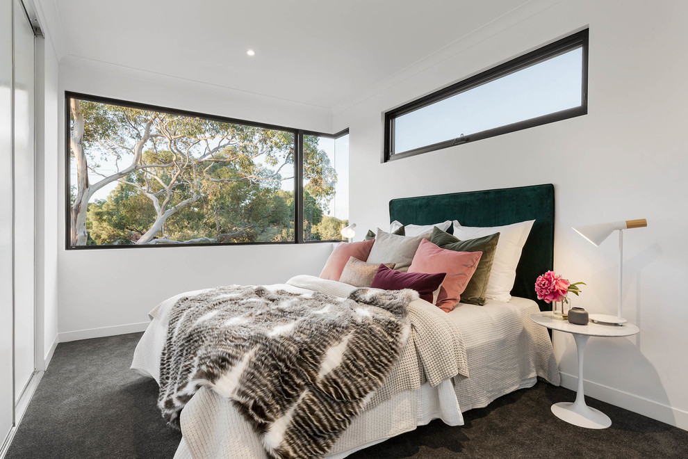 Inspiration for a scandinavian carpeted and gray floor bedroom remodel in Melbourne with white walls